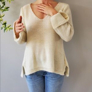 White sweater from Paris France, made in Italy